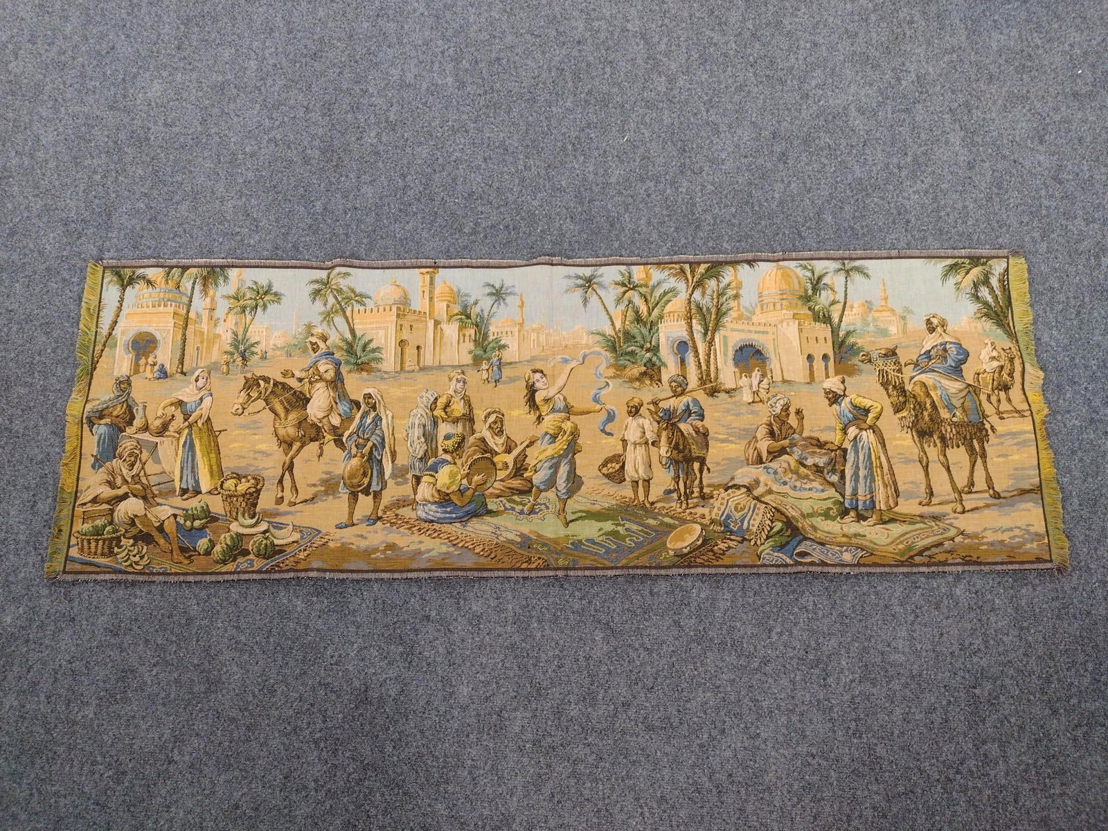 Vintage Tapestry Runner: Arabian market scene. No makers tag, probably Belgian or French. Measures 57" x 20". No rips, tears or repairs. 