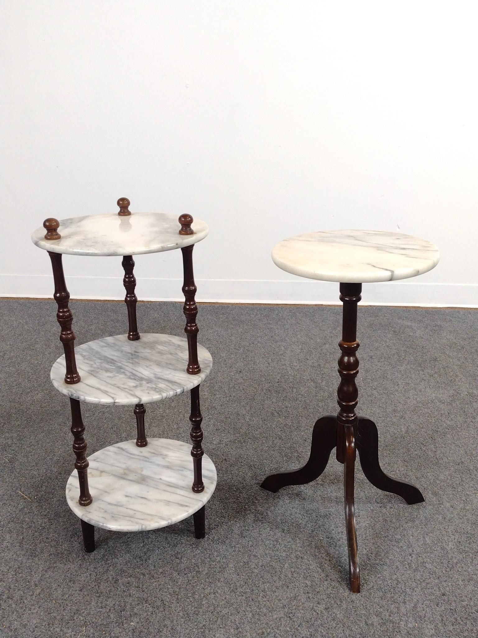 2 Marble Top Accent Stands: Etagere and pedestal table. 12" diameter X 23-1/2" to 26-1/2" high. Both have some light scratches to wood. No manufactures name found.