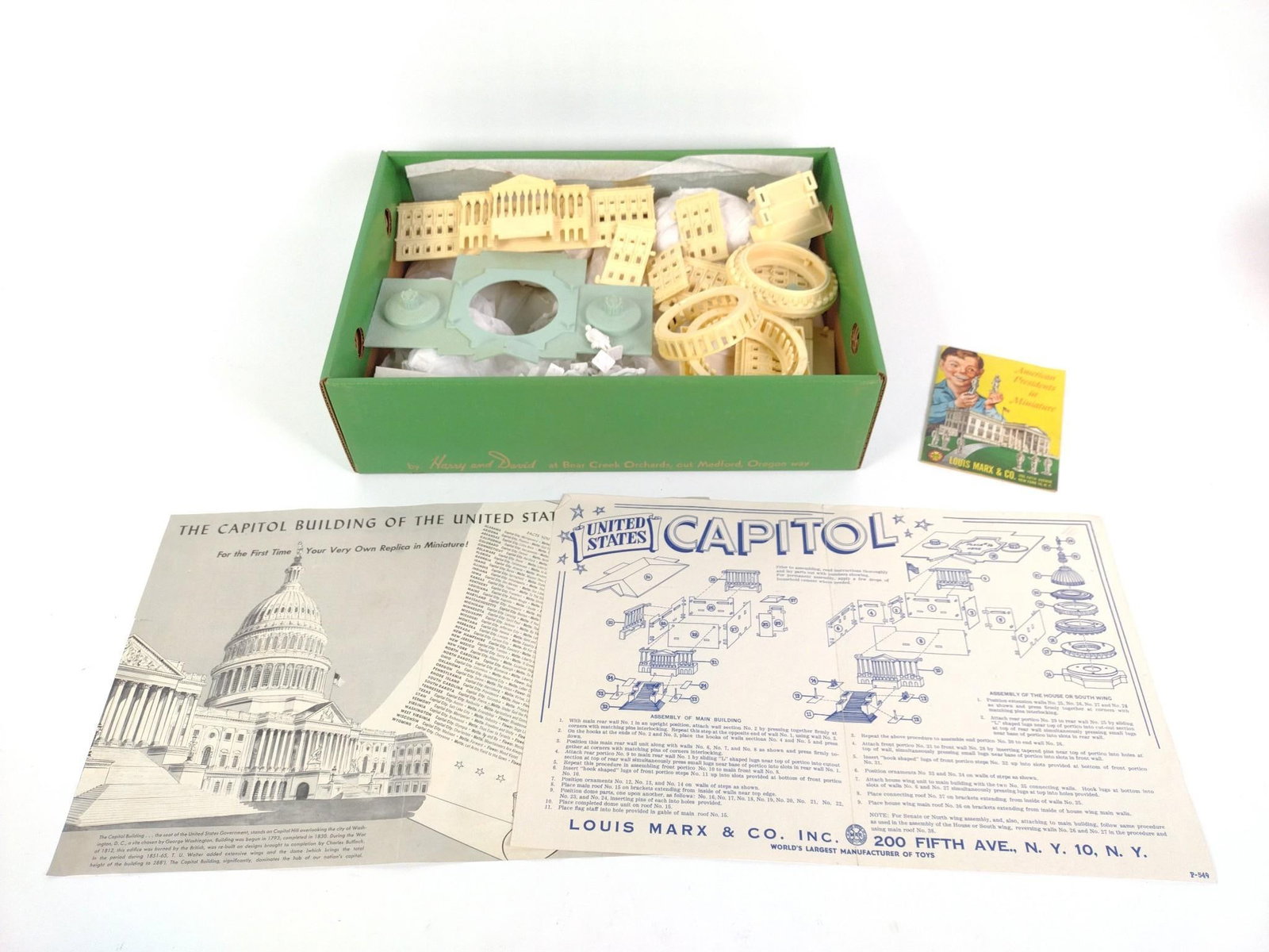Louis Marx & Co. Model Capitol & American Presidents In Miniature: Includes the Capitol Building with Figurines. "Easy to assemble and take apart." In good condition. Stored in "Fruit of the Month Club" box. Pieces vary in size. 