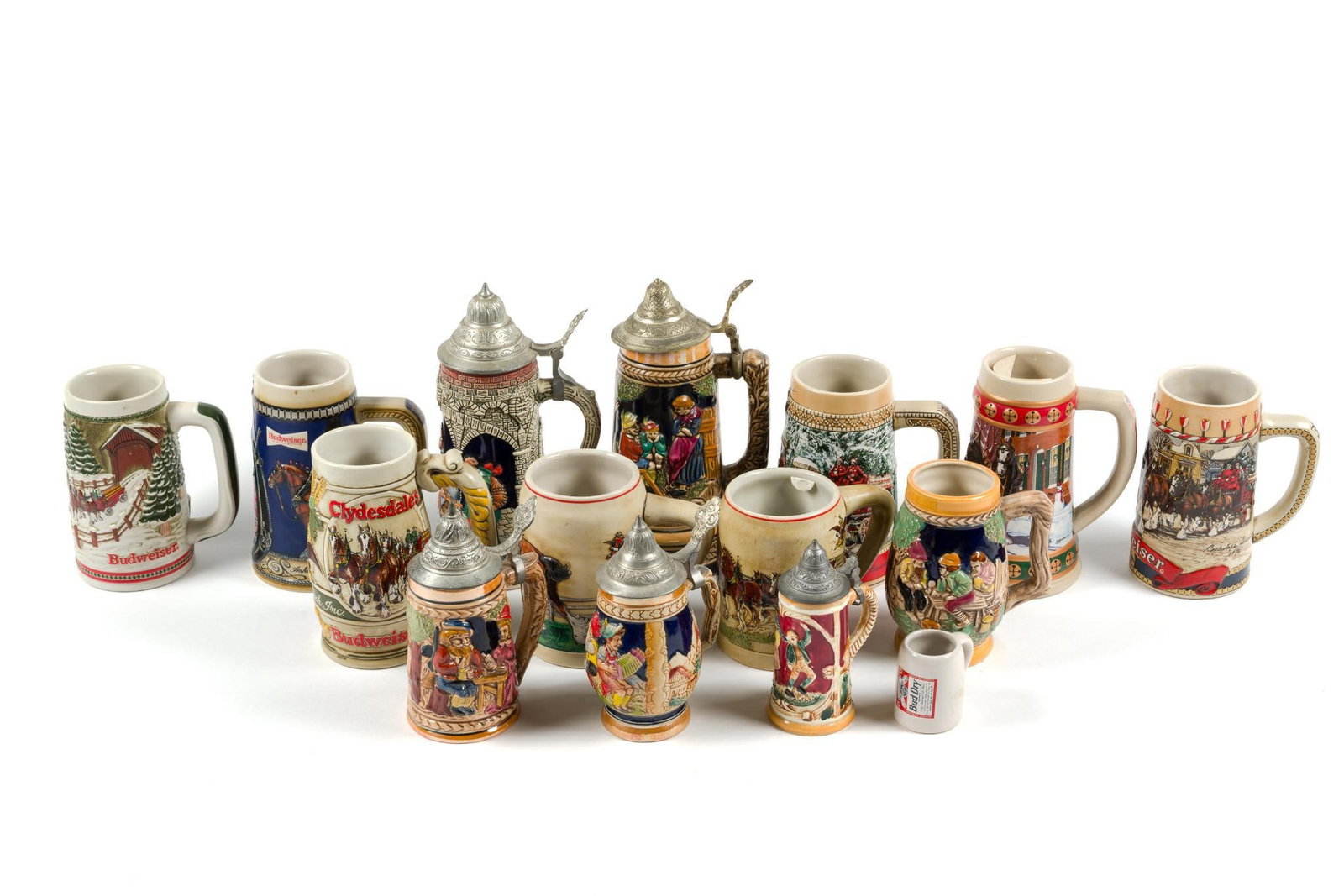 15 Beer Steins Incl. Budweiser: Largest measures 9-1/2" tall. 