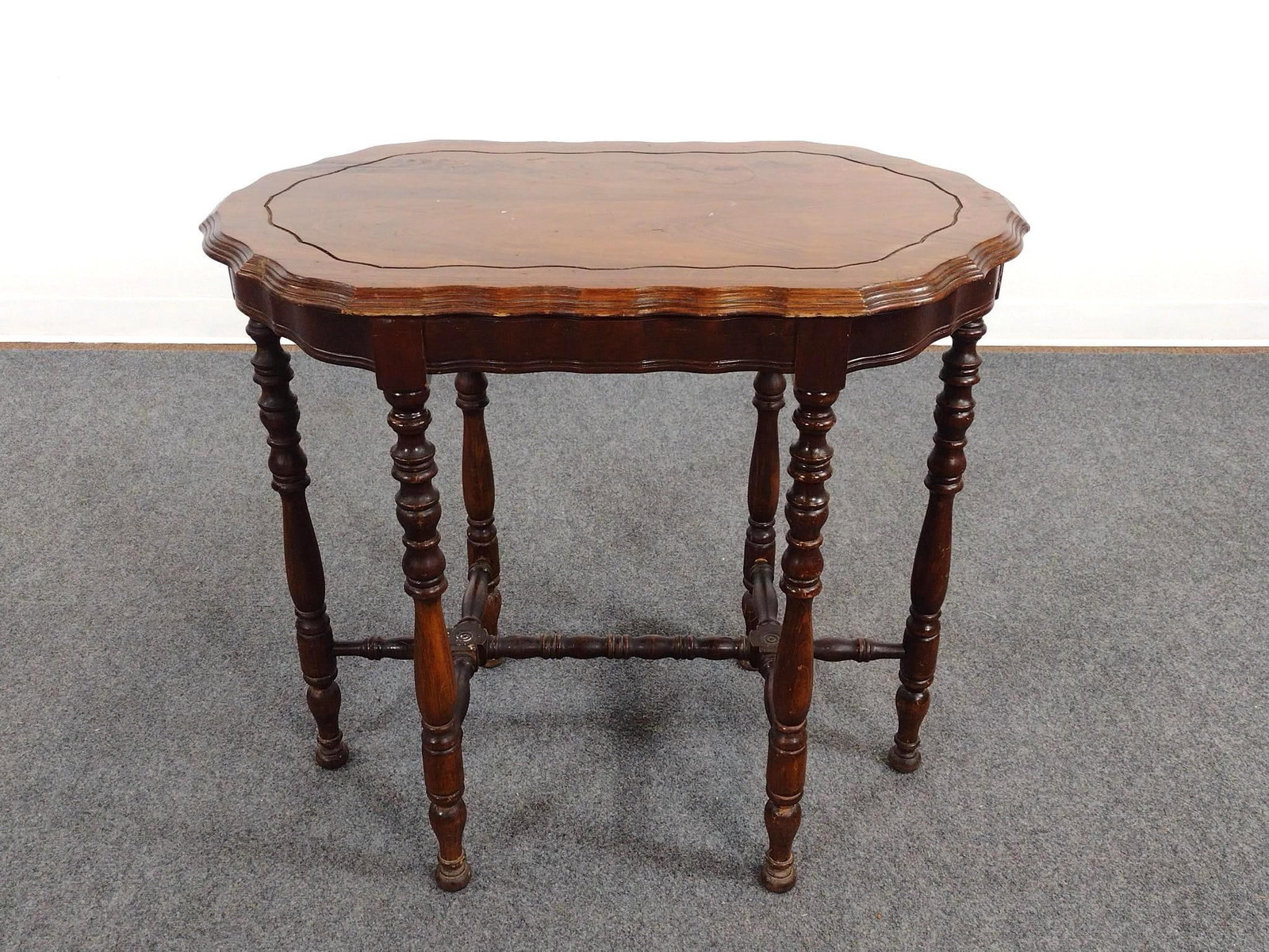 Antique Scalloped Parlor or Occasional Table: 32" wide X 19" deep X 29" high. Has scratches and areas of finish loss. 