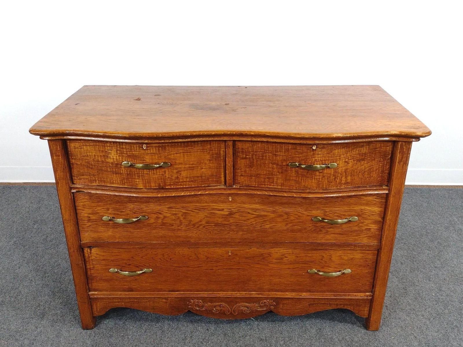 Antique Oak Serpentine Dresser: 45" wide X 21-1/2" deep X 30-1/2" high. Has some light wear. 