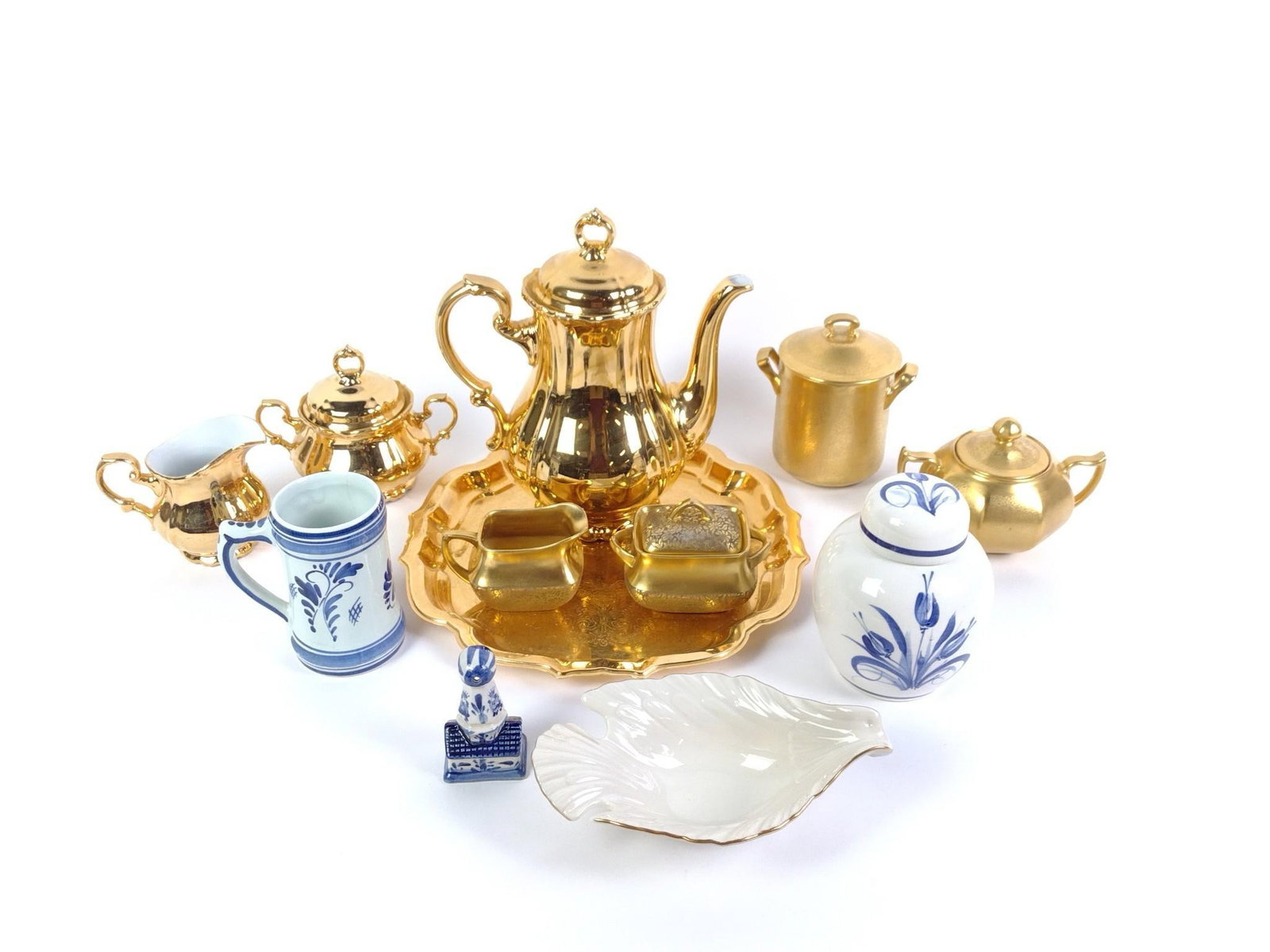 Porcelain Tea Sets & Decor Incl. Lenox & Delft: Includes two gold-plated sets. Largest piece measures 8-3/4" x 5" x 8". Smallest piece measures 1-1/4" x 3/4" x 2".