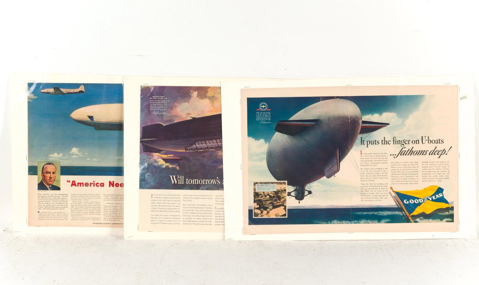 3 Goodyear Aircraft Advertisements: Includes "America Needs All Three"; "Will Tomorrow's Aircraft Carriers Fly?; and "It puts the finger on U-boats...fathoms deep!" 14" long x 20-1/2" wide. 