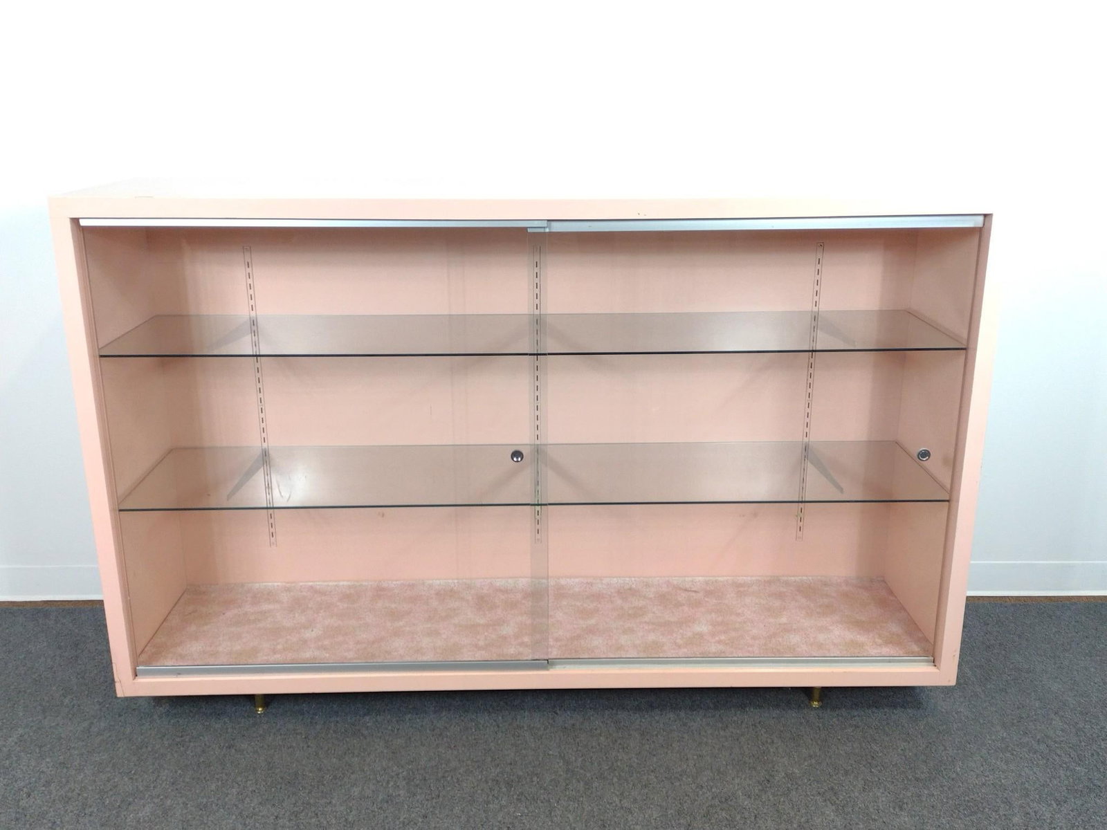 Mid-Century Modern Sliding Glass Door Display Case: 72" wide X 18" deep X 46" high. Has some scratches.