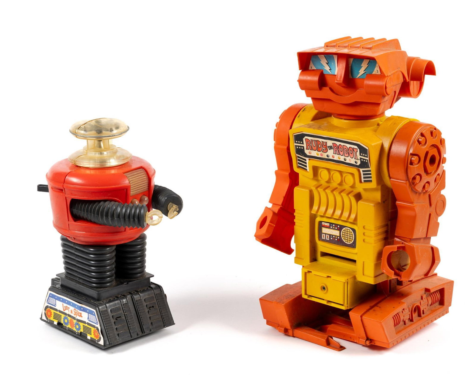 Vintage Rudy The Robot & Remco Lost In Space B-9 Robot: Rudy measures 10" x 6" x 16" and B-9 measures 6" x 7" x 12-1/2".