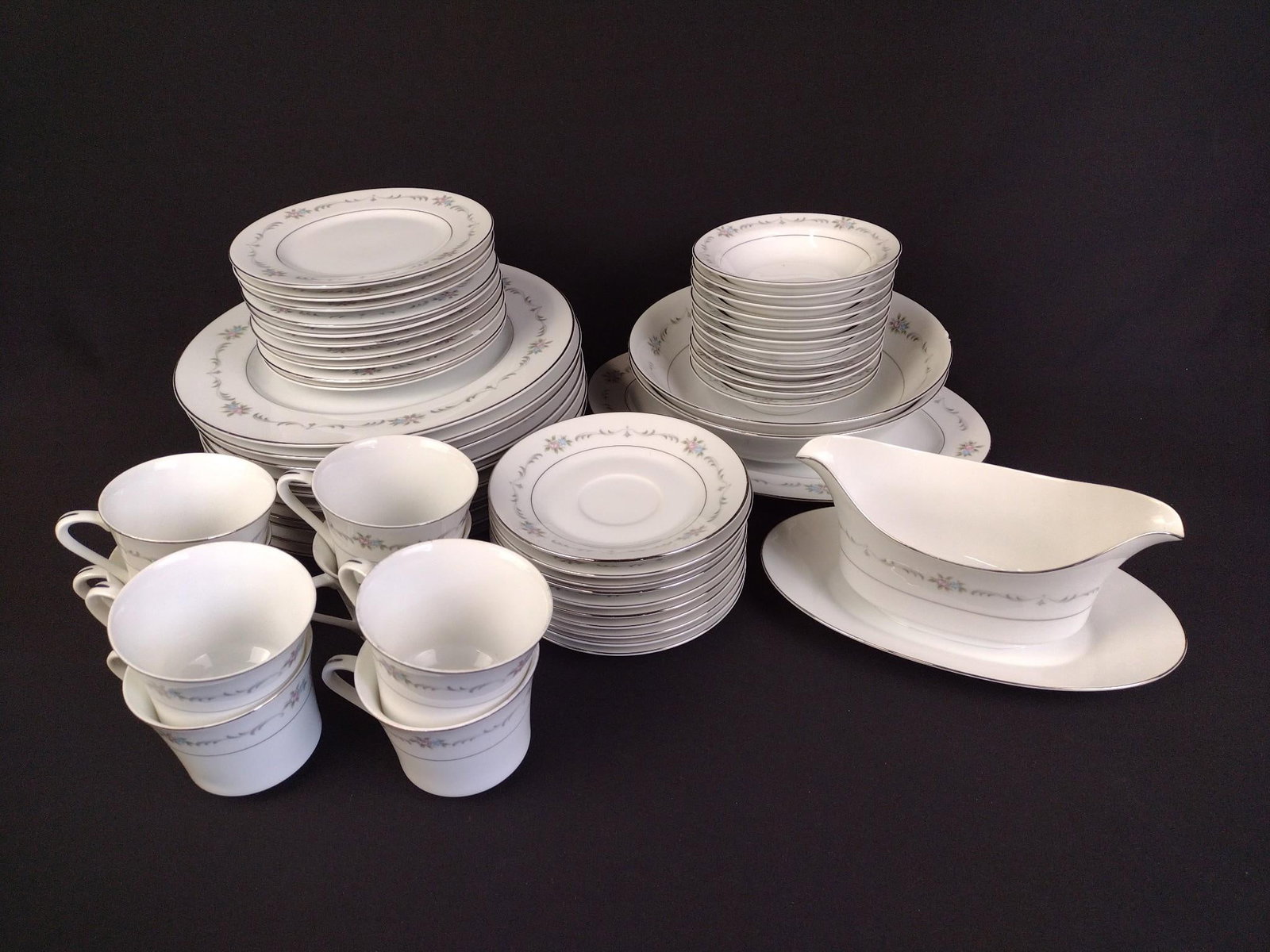 Charles Bishop "Versailles Springsong" Luncheon Service: 53 pieces. Dinner plate 10-3/4" diameter. 