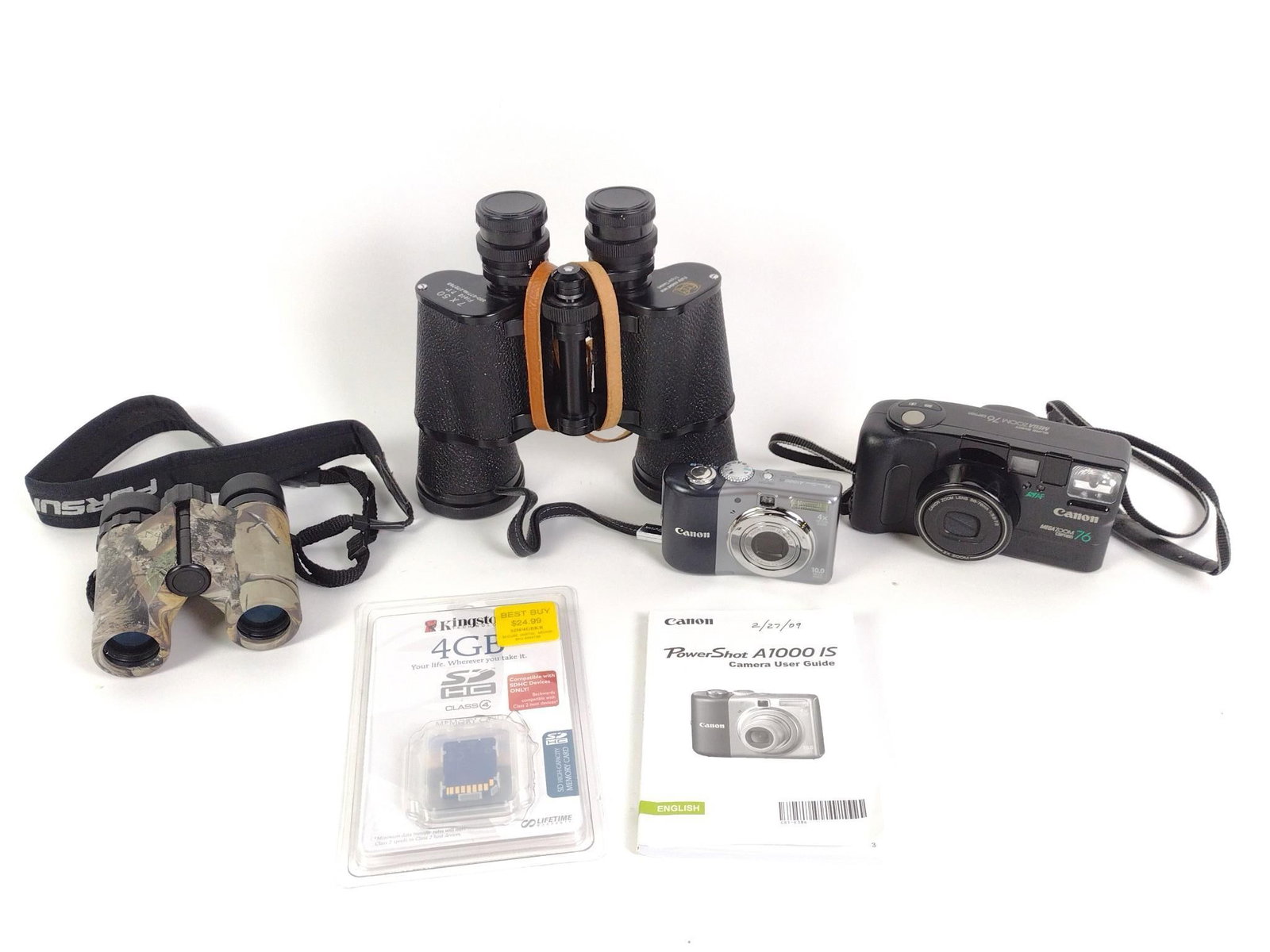 2 Pairs Binoculars & 2 Canon Cameras: 4-3/4" to 9" wide x 5-1/4" to 8" high. 