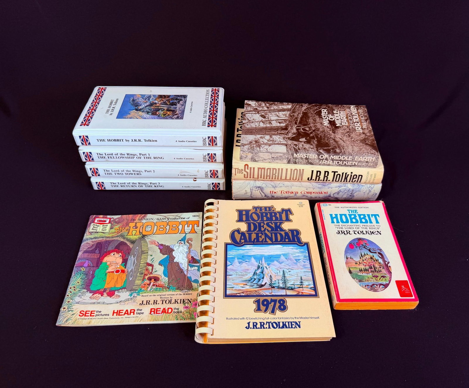 J.R.R. Tolkein Books & Lord Of The Rings Media: Includes a first edition, seventh printing of "The Silmarillion," 5 books about The Hobbit and J. R.R. Tolkein himself and a set of The Hobbit and The Lord Of The Rings BBC Audio Collection on