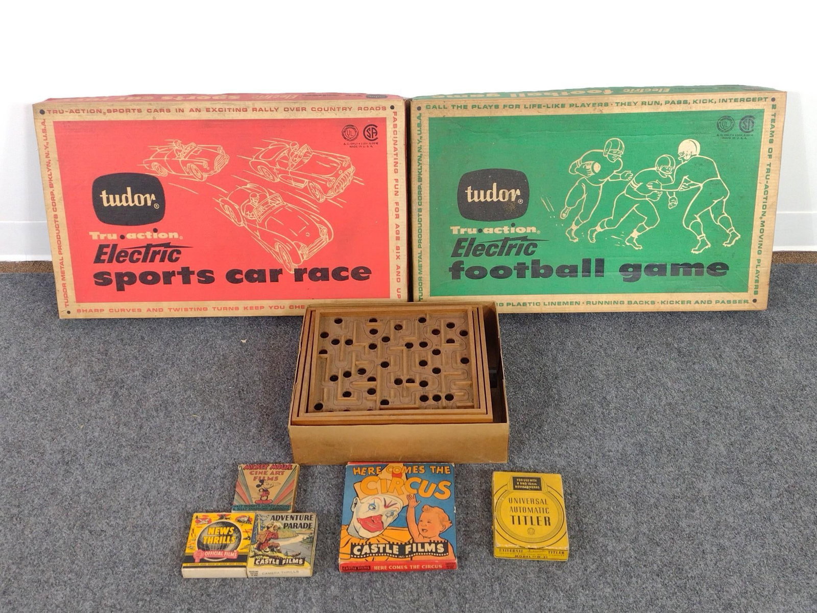 3 Vintage Table Top Games & 4 Castle Film Rolls: Also includes a Universal Automatic titler. Largest pieces measure 16-1/2" x 27" and smallest piece measures 3-3/4" x 4". 