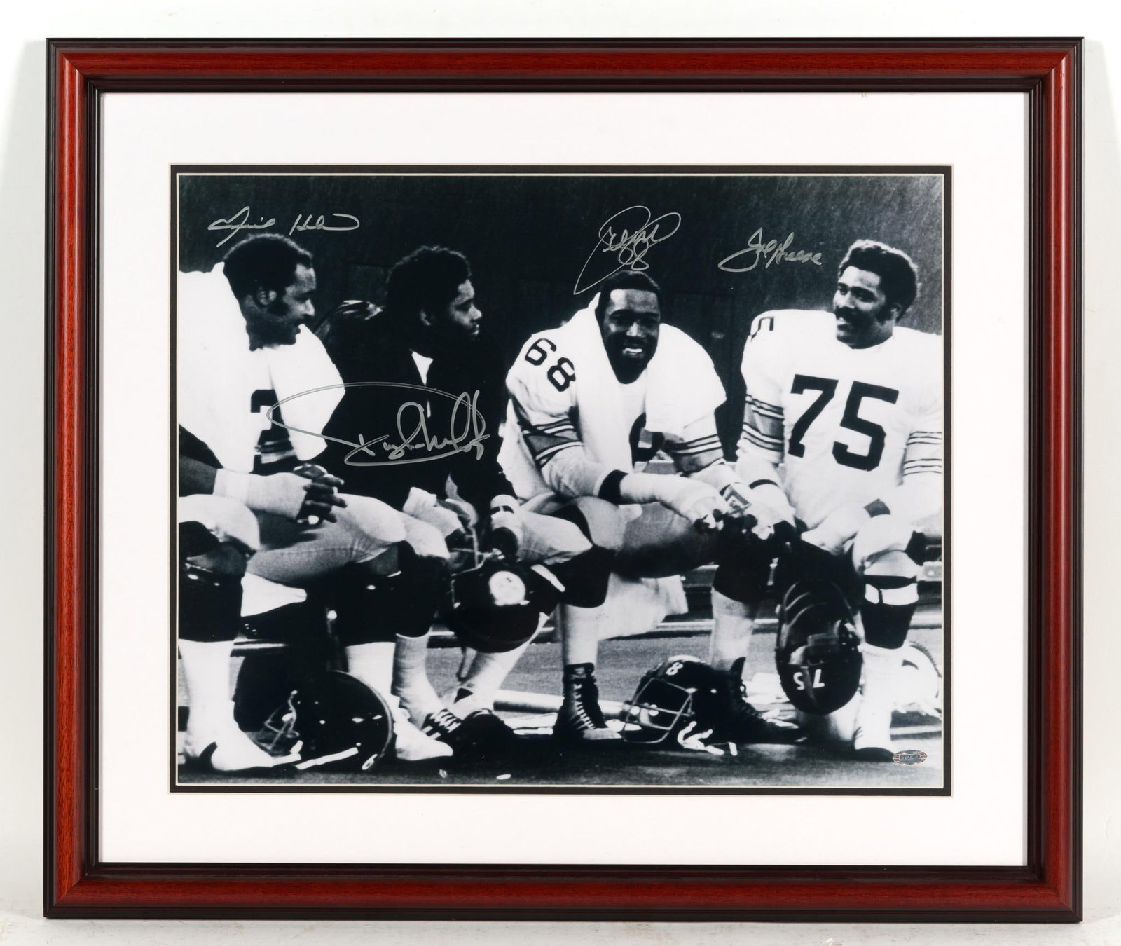 1970s Pittsburgh Steelers "Steel Curtain" Autographed Photo w/ COA: Signed by Joe Greene; L.C. Greenwood; Dwight Wight; and Ernie Holmes. Depicts them sitting on sidelines on the bench. COA attached to the back. 22-1/2" long x 26-5/8" wide. 