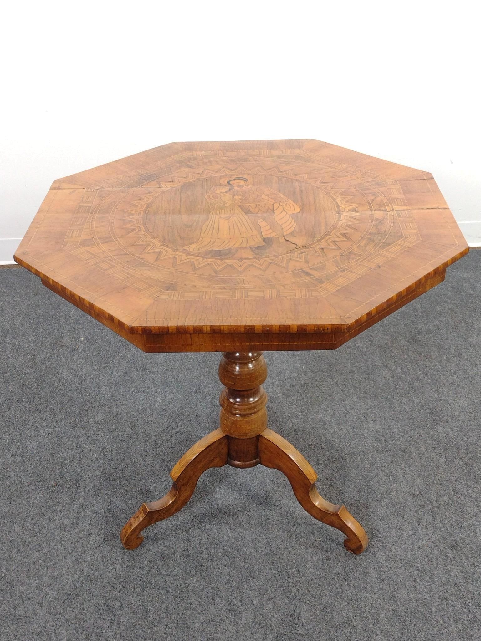 19th C Italian Sorrento Marquetry Occasional Table: 30" wide X 29-3/4" deep X 29-1/2" high. Top starting to split. Also has some finish loss and sun fading. Provenance: From the Estate of Lory Patrick Jones (1933–2026), actress, writer, dir