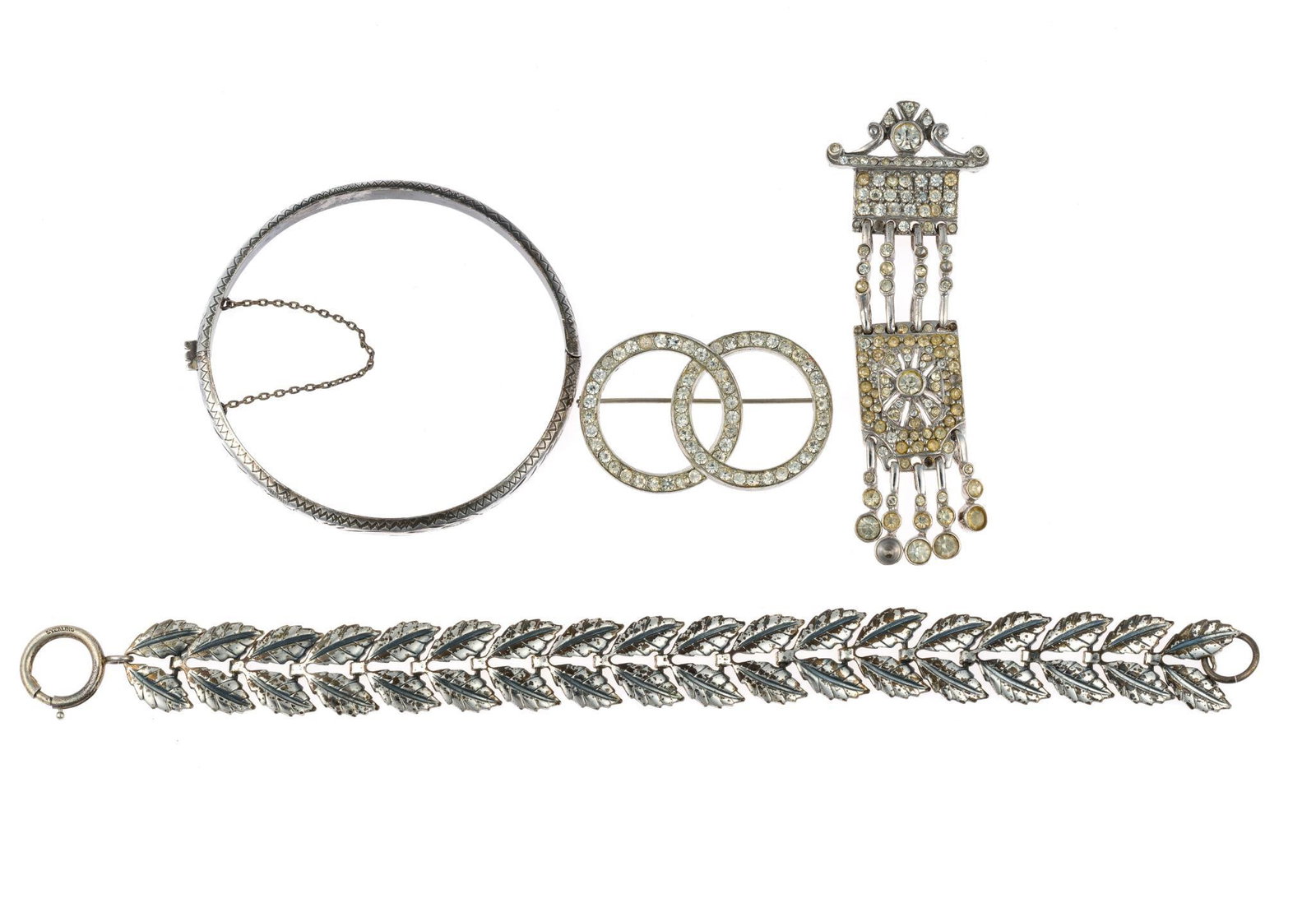 Sterling Silver Jewelry Incl. Rhinestone: All marked. Includes bracelet, bangle, and two pins. Bracelet measures 3/4" wide x 8-1/4" long. Bangle inside diameter 2-1/2" wide. Pins measure 1-1/4" to 1-3/4" wide x 1-1/8" to 3-1/4" long. Total 1.