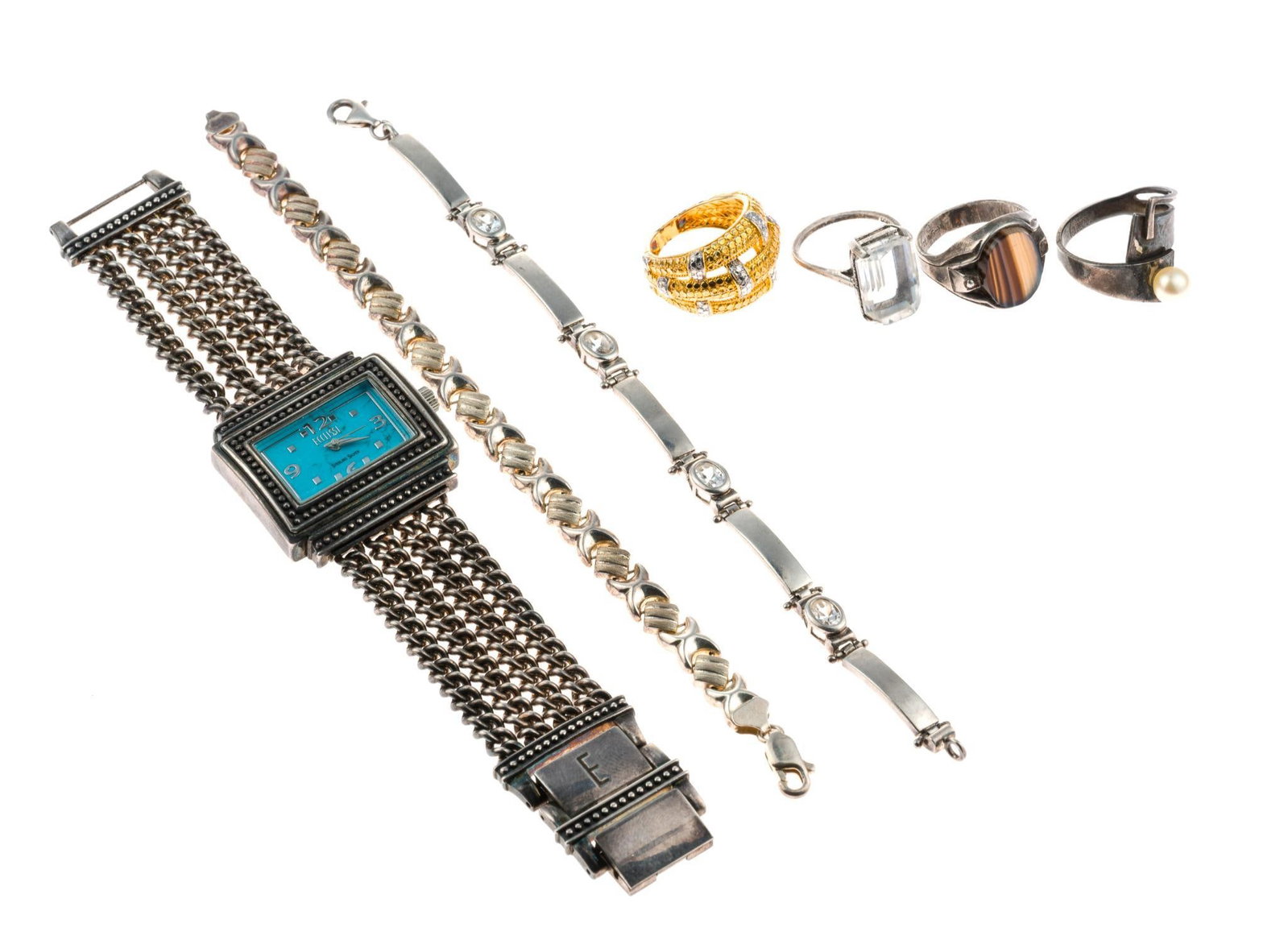 Sterling Silver Jewelry: All marked. Includes 4 rings, 2 bracelets, and watch. Ring sizes 7.25 to 8. Bracelets measure 3/8" wide x 7-1/4" long. Watch measures 1-3/8" wide x 7" long. Total 4.18 ozt. Without watch 1.41