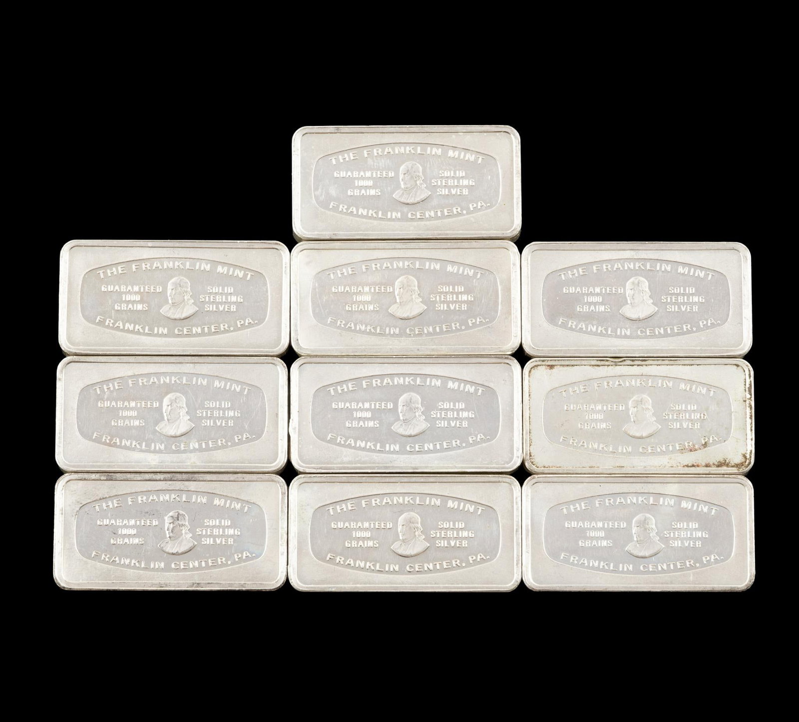 Ten Pure Silver Bars: 1000 grain Franklin mint bars 2.08 troy ounces each, issued on behalf of various US banks.