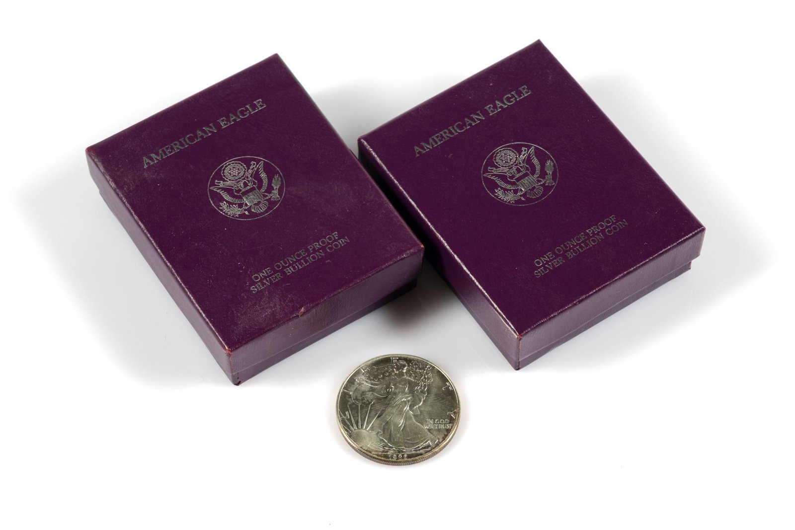 Three Silver American Eagle One Dollar: Two are proofs in original boxes and one is uncirculated.
