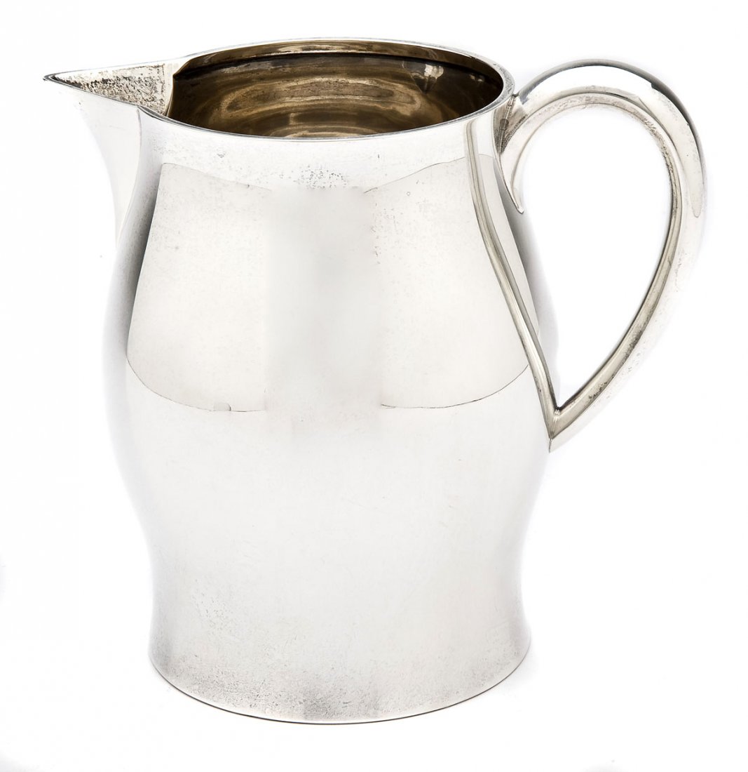 Tuttle Sterling Pitcher Circa 1940: DESCRIPTION: Tuttle sterling silver pitcher in the Paul Revere pattern circa 1940. Holds 3-1/2 pints. Marked on the bottom "Sterling 220 A", "3-1/2 pints", and "P. Revere Pattern" with Tuttle makers m