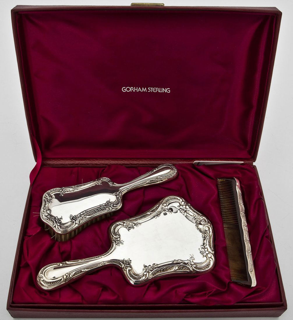 Three Piece Gorham Sterling Dresser Set: DESCRIPTION: Three piece Gorham sterling silver dresser set in the 27 pattern. Includes: a 6-7/8" tortoise shell comb, a 9-5/8" x 4-7/8" mirror, and a 8-1/4" x 3" boar bristle and rosewood brush. Each
