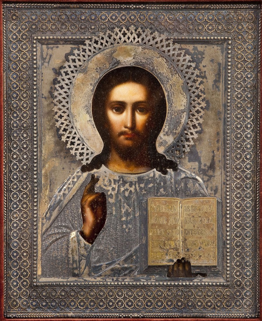 1884 Russian Icon of Christ Pantocrator: DESCRIPTION: 1884 Russian icon of Jesus Christ Pantocrator. Tempera on board with silver oklad with gilt metal book within geometric frame. Assayed by Aleksandr Frans Fan-der-Flit. Marked twice, once 