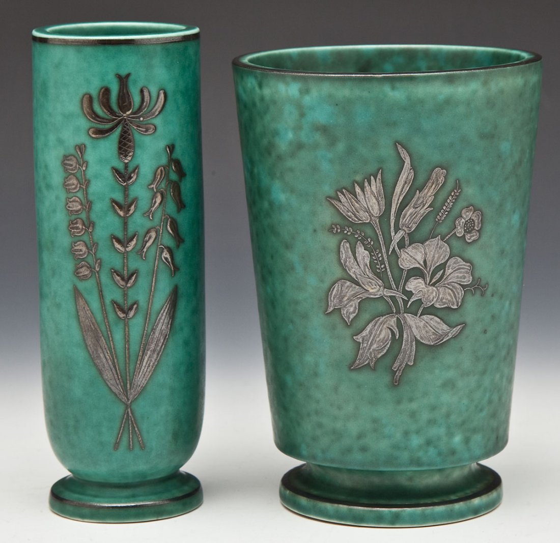 2 Gustavsberg Argenta Vases: DESCRIPTION: Two Gustavsberg Argenta vases. Teal in color with silver floral images, rims and bases. Larger vase marked "Gustavsberg Argenta Sweden", "1157", and "2005". Smaller marked "Gustavsberg Ar