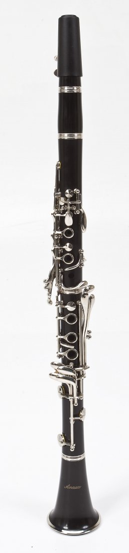 Anaxa Bb Concert Clarinet in Case: DESCRIPTION: Anaxa B flat clarinet in case. Serial No. 10343. Ebonite body, nickle silver plated keys, Includes extra reeds, cleaning cloths, gloves, screwdriver, corkgrease and strap. MEASUREMENTS: C