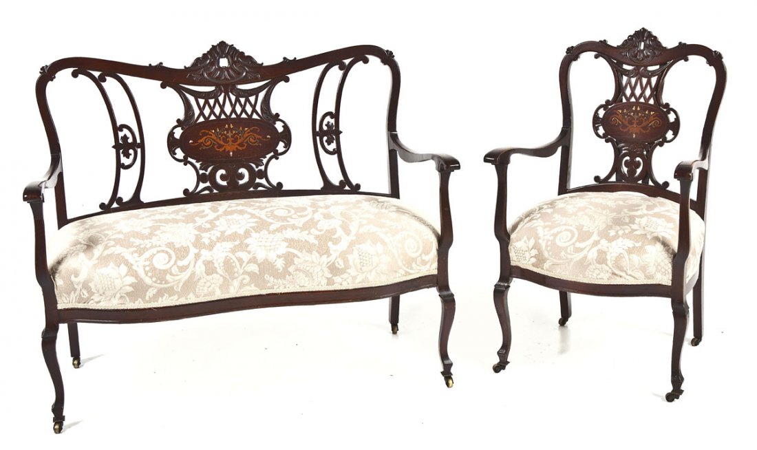 Art Nouveau 2 Pc Parlor Suite: DESCRIPTION: A turn of the century mixed wood Art Nouveau parlor set consisting of a settee and matching armchair. The cabriole legs supporting a curvaceous frame with pink damask upholstery. The back