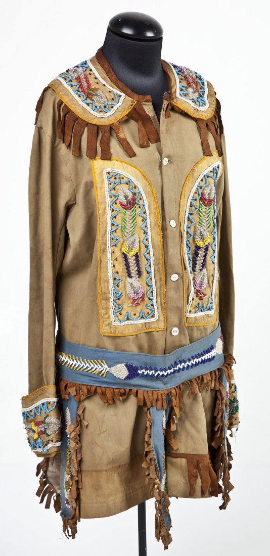 Vintage Native American Beaded Shirt: DESCRIPTION: Vintage Native American shirt with attached beaded panels with feather motif. Belt with floral motif. MEASUREMENTS: Jacket 20" X 33". Belt 42" x 14". CONDITION: Some beads missing. Stray 