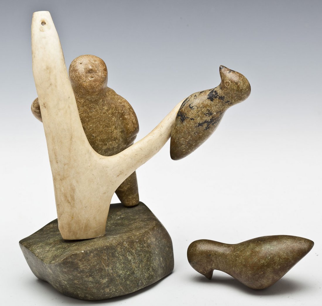 Signed Inuit Sculpture Man with Tree & 2 Birds: DESCRIPTION: Inuit sculpture of a man with tree and birds of stone and antler bone. Signed "Kupa", possibly for Kupapik Ningeocheak. Man stands reaching up to tree where two birds sit. MEASUREMENTS: O