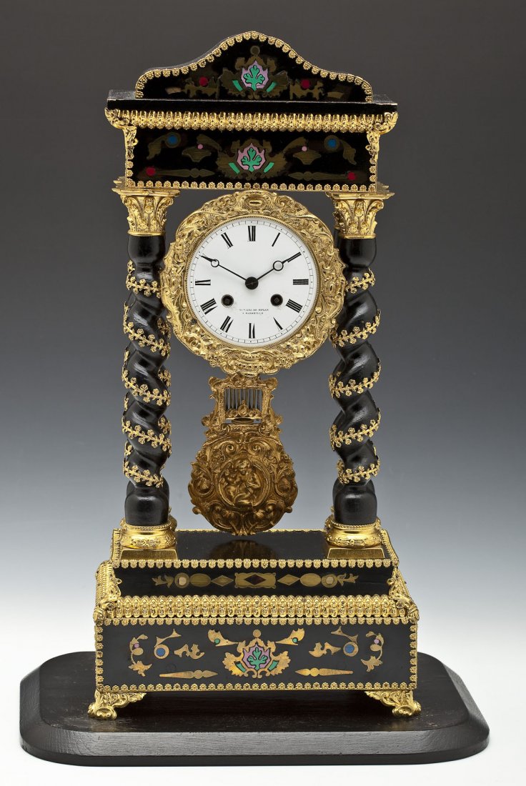 French Barbot Portico Clock: DESCRIPTION: French portico clock. White porcelain dial with Roman numerals, marked "De Rozan A Marseille". Brass eight day works signed "Barbot". Floral inlaid case with ormolu mounts. Under a glass