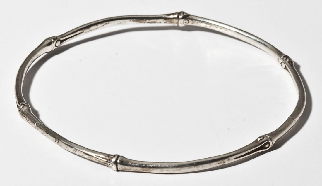 John Hardy Sterling Silver Bamboo Bangle: DESCRIPTION: Sterling silver bangle bracelet by John Hardy in the form of bamboo. Marked "JH 925 This Planted 5 Bamboos on Nusa Penida". Opening 2-1/2".