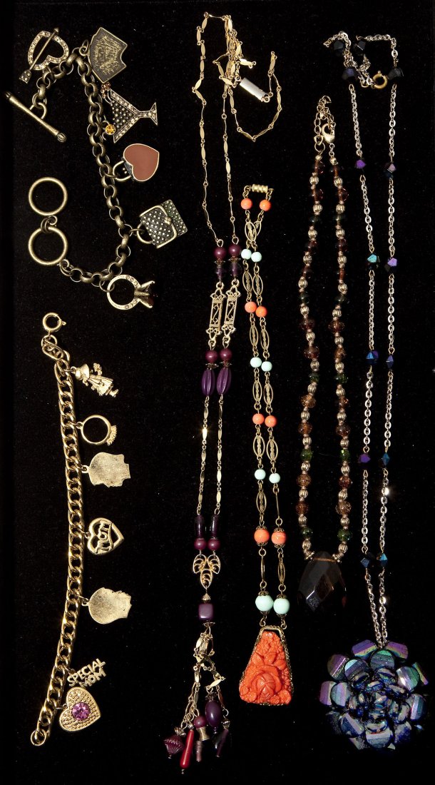 6 Pieces of Fashion Jewelry: DESCRIPTION: Six pieces of fashion jewelry. Includes: four beaded necklaces and two charm bracelets.