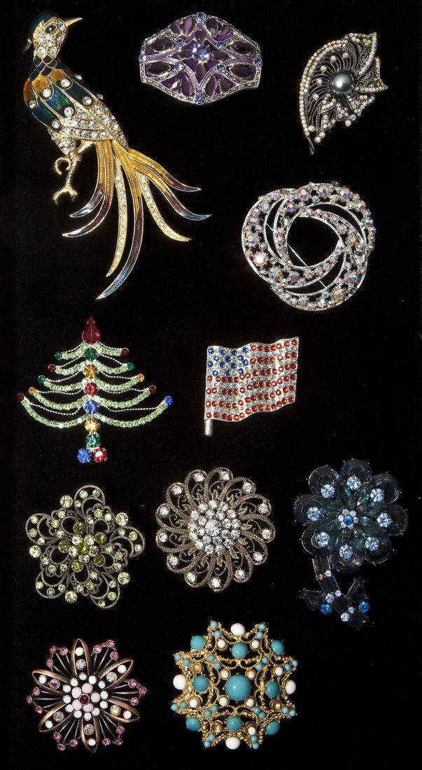 11 Fashion Pins: DESCRIPTION: Eleven fashion pins including Monet and Judith Green. 1-1/2" to 5" long. CONDITION: Blue stone flower missing bar pin to back.