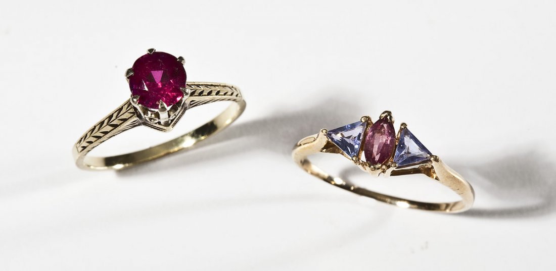 2 14K & Gemstone Rings: DESCRIPTION: Two rings in marked 14K yellow gold. Includes: 1) One synthetic ruby solitaire in high setting. Size 7-1/4. 1.7 dwt (2.7 gr). 2) One set with one marquise pale pink tourmaline and two tri
