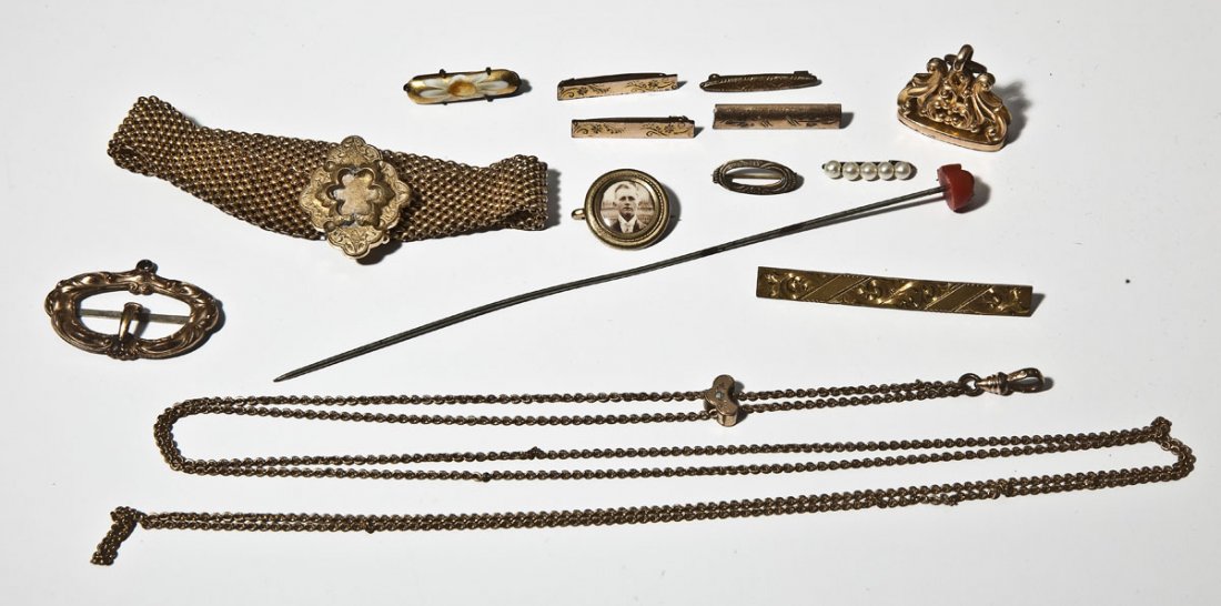 14 Pieces Vintage & Antique Jewelry: DESCRIPTION: Fourteen pieces vintage and antique jewelry including watch fob, bar pins, watch chains with slides, celluloid photo pin and more.