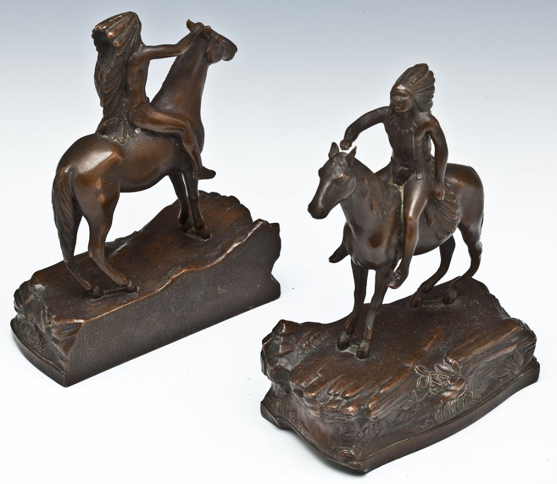 Pair Jennings Bros Indian Bookends: DESCRIPTION: Pair of bronze finish over chalk bookends portraying Indian on horseback on naturalistic bases. Both marked "JB 1927" for Jennings Bros. MEASUREMENTS: 7-1/2" high. CONDITION: One with hor