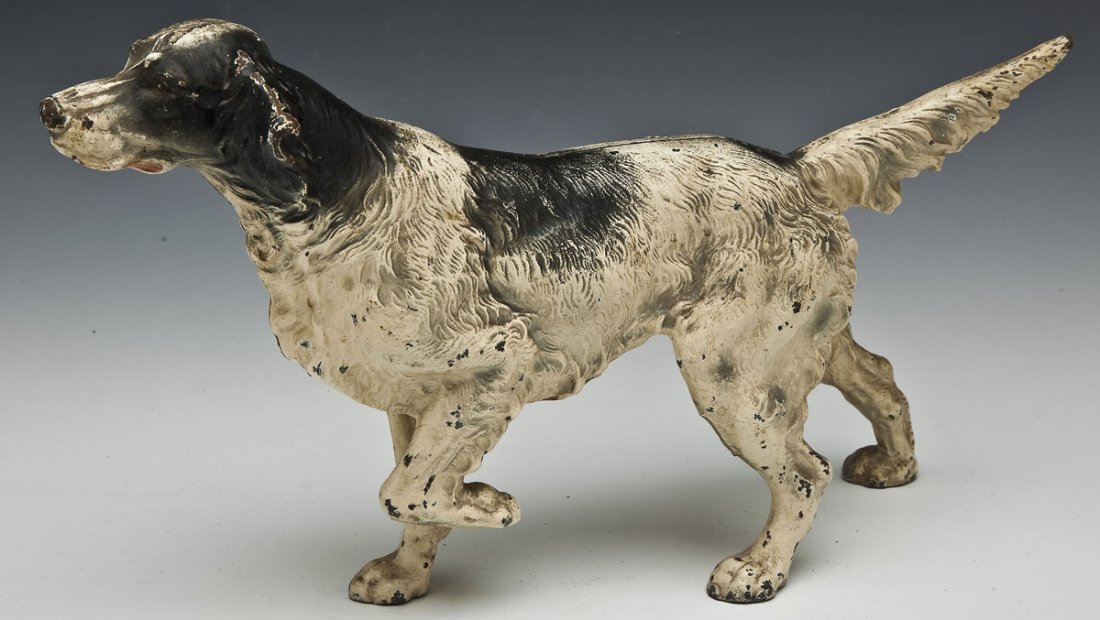 Hubley English Pointer Doorstop: DESCRIPTION: A painted cast iron English pointer doorstop by Hubley. MEASUREMENTS: 15-1/2" long x 8-3/4" high. CONDITION: Minor paint wear, approximately 80-90% complete.