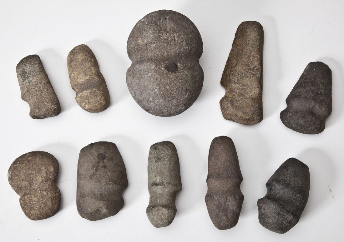 10 Native American Stone Tools: DESCRIPTION: Nine axe heads and one maul. Five axes are 3/4 grooved and four are full groove. Maul is full grooved. MEASUREMENTS: Ranging 4-1/2" to 7-1/2". CONDITION: Shows expected wear.