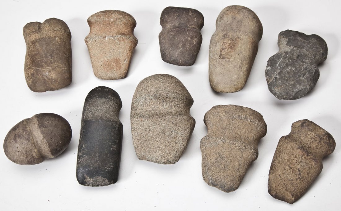 10 Native American Stone Tools: DESCRIPTION: Ten stone tools including seven full groove axes, two 3/4 groove axes and one full groove maul. Of varying materials. MEASUREMENTS: Ranging from 3-1/2" to 7". CONDITION: Shows expected we