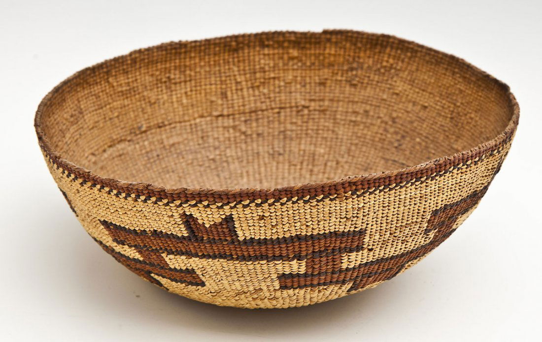 Northern California Indian Basketry Hat: DESCRIPTION: Northern California Indian shallow basketry hat of tightly and finely woven various colored grasses with geometric bands. MEASUREMENTS: 7-1/8" diameter x 3" high. CONDITION: 3-1/2" repair