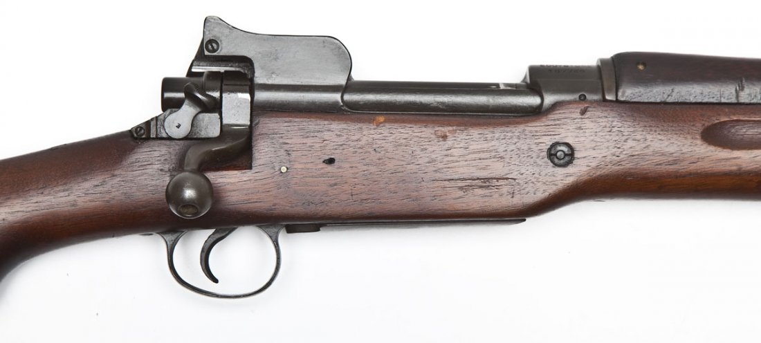 Eddystone US Model of 1917 Rifle - .30-06 Cal.: SERIAL #: 167749 DESIGN: Bolt action with internal magazine. 26" barrel. MATERIAL/FINISH COMPOSITION: Blued steel. Full length military wood stock. FEATURES: Semi hooded front sight. Rear two stage pe