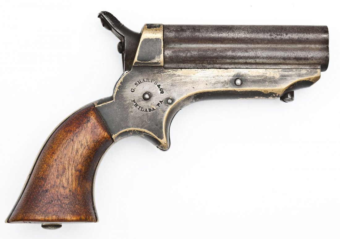 C. Sharps & Co. 4-Shot Pepperbox Pistol: SERIAL #: 16151 DESIGN: 1st model single action breechloader with 4-barrel cluster. 2-1/2” barrels. .22 caliber. MATERIAL/FINISH COMPOSITION: Blued steel. Brass frame. Smooth walnut grip panels. FEA