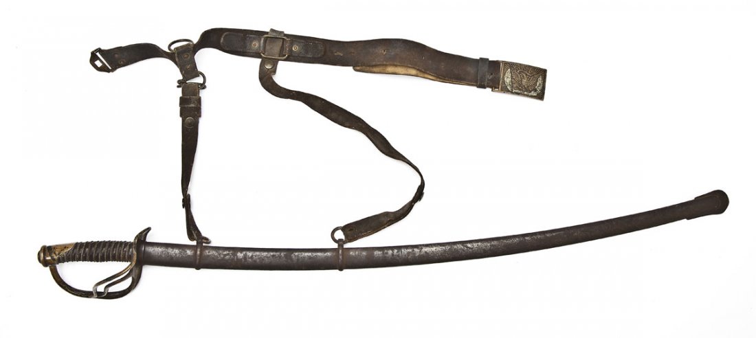 Civil War Cavalry Sword with Scabbard and Belt: DESCRIPTION: Civil War cavalry sword with wire wrapped leather grip and brass hand guard. Stamped "C. ROBY / W. CHELMSFORD / MASS" on the right ricasso and "US / 1864 / A.G.M." on the left ricasso. Br