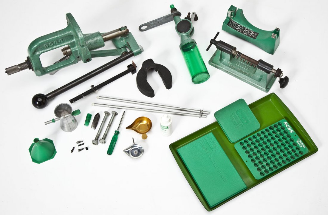 RCBS Rock Chucker Reloading Kit & Accessories: DESCRIPTION: Collection of RCBS reloading equipment. Includes: Rock Chucker Single stage press, case trimmer, powder scale, powder dispenser, primer tubes and tray, case lube pad and lubricant, green 