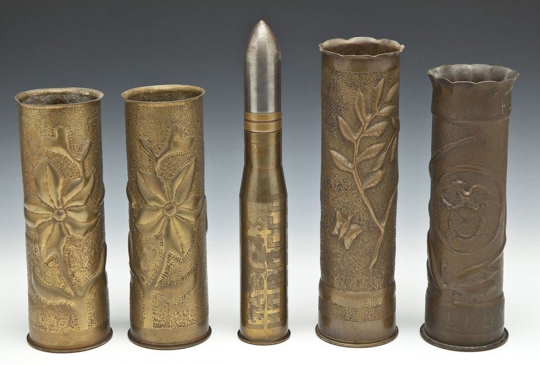Collection of 5 Pieces of Trench Art: DESCRIPTION: Collection of 5 pieces of trench art. 4 made from 75mm shells, one from 37mm shell. 37mm marked "Italy-43 / Morocco / Algeria / Tunisia / Sicily". One 75mm marked "M. Belluna", another ma