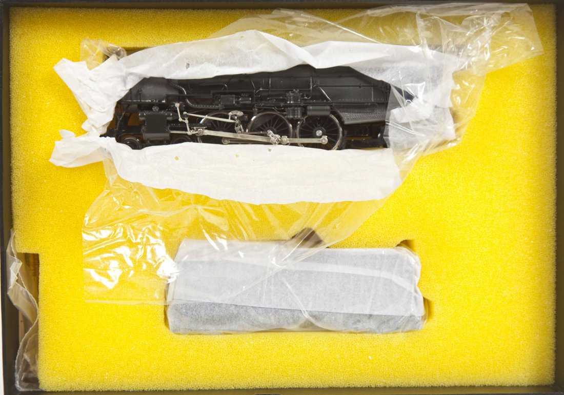 Key PRR K-5 Pacific #5698 Brass Loco & Tender: DESCRIPTION: Key Imports Pennsylvania K-5 Pacific #5698 Post War Version painted brass locomotive and tender. HO scale. CONDITION: Appears lightly, if at all, used in original box.