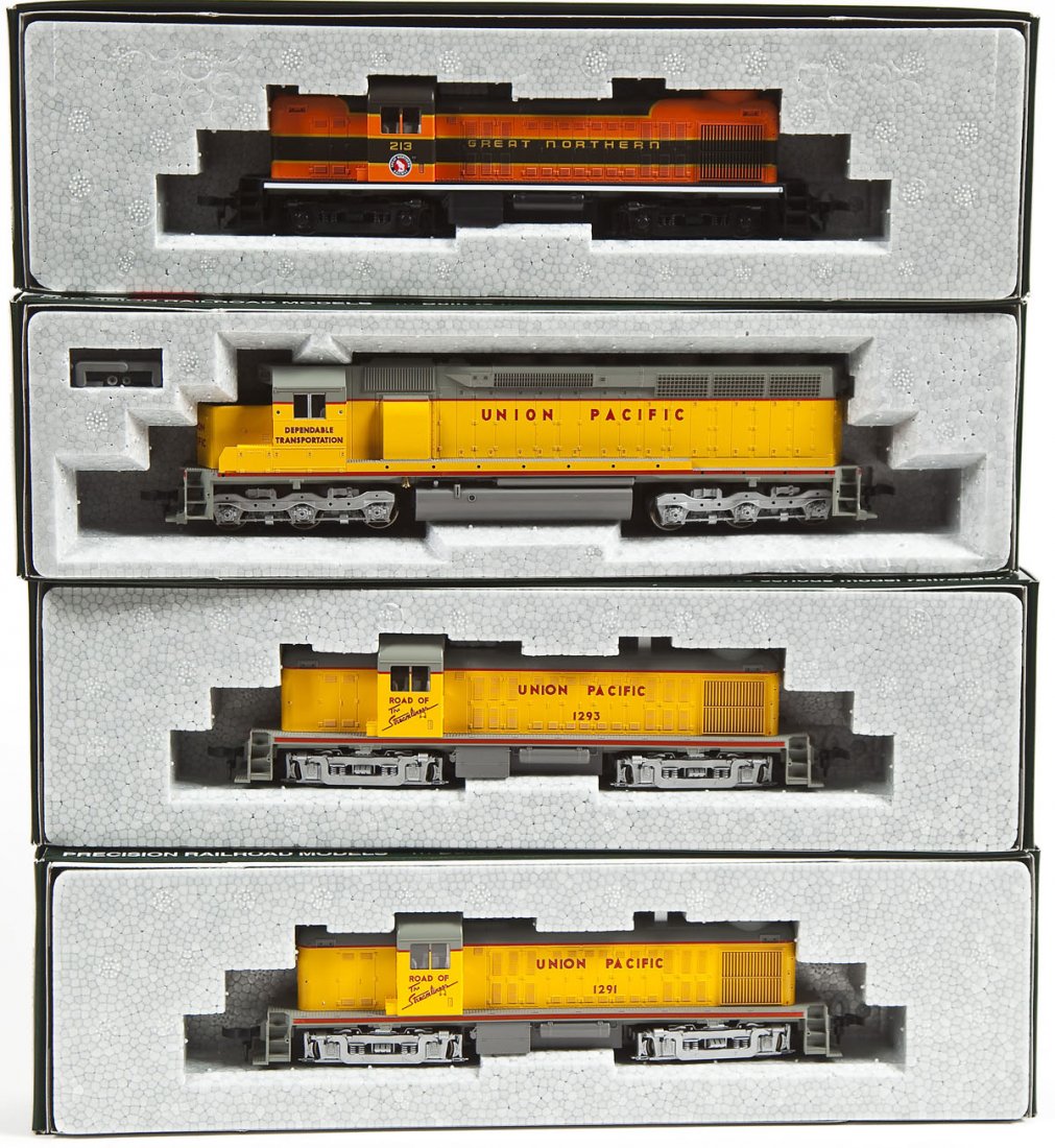 4 Kato Alco & EMD Locomotives: DESCRIPTION: Four Kato Alco and EMD locomotives including UP #1293, UP #1291, UP unnumbered, Great Northern #213. HO scale. CONDITION: Appear unused in original boxes.