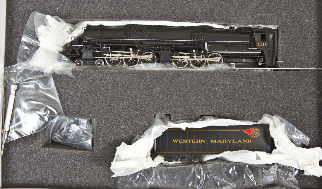 Precision Scale WM M-2 Brass Locomotive & Tender: DESCRIPTION: Precision Scale Company Western Maryland M-2 rebuilt and factory painted brass locomotive and tender. HO scale. CONDITION: Appears slightly if at all used in original box.
