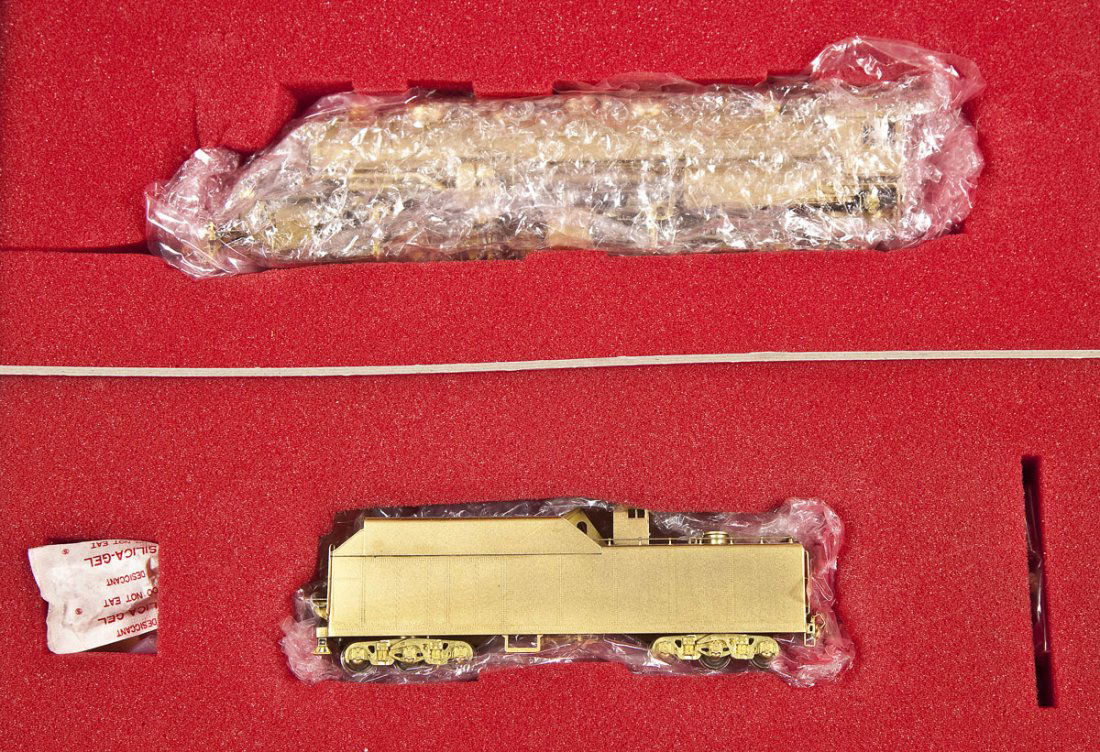 Key/Samhongsa N&W Y-4 Brass Locomotive & Tender: DESCRIPTION: Key Imports N&W Y-4 brass locomotive and tender. Made by Samhongsa. HO scale. CONDITION: Appears slightly if at all used in original box with paperwork.