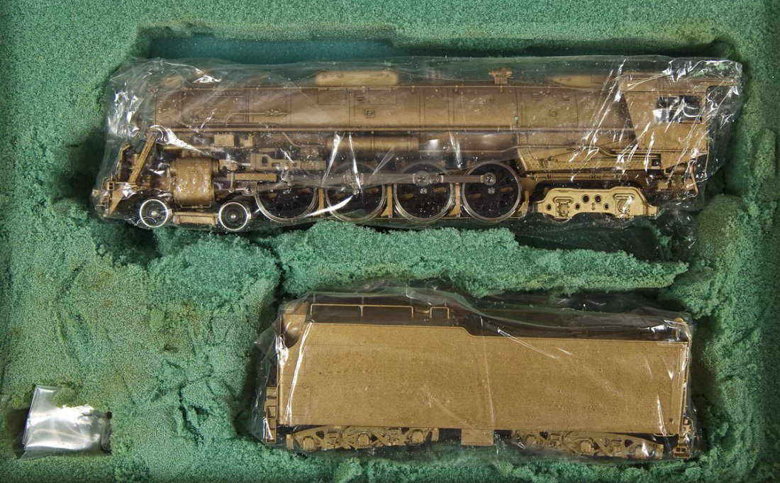 Hallmark Rock Island R-67 Brass Loco & Tender: DESCRIPTION: Hallmark Models Rock Island R-67 brass locomotive and tender. HO scale. CONDITION: Appears lightly used in original box. Foam inserts are disintegrating.