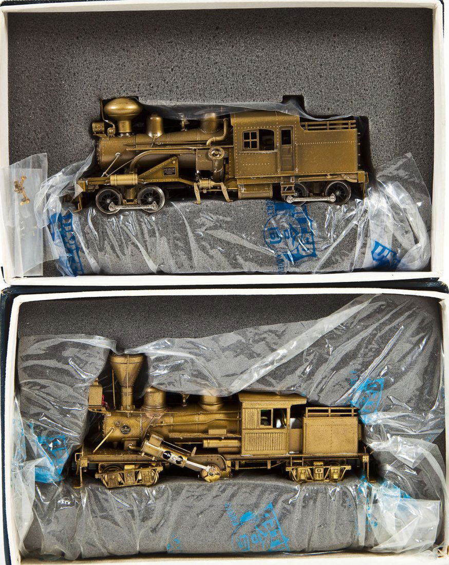 2 United Scale Locomotives Logging Climax & 65 Ton: DESCRIPTION: Two United Scale Models brass locomotives including Logging Climax Class B and 65 Ton Heisler. HO scale. CONDITION: Appear slightly if at all used in original boxes.